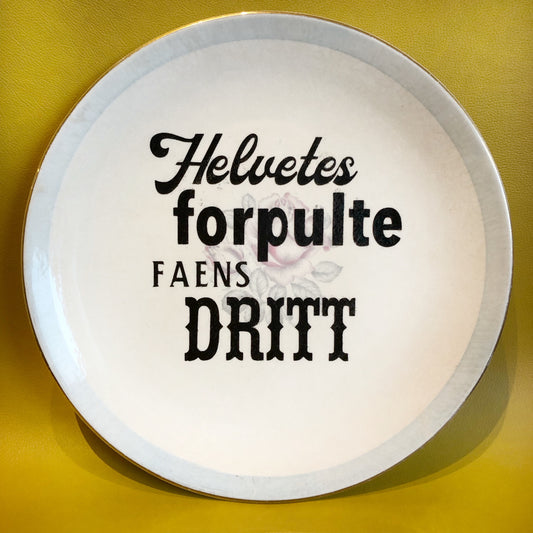 Helvetes forpulte faens dritt